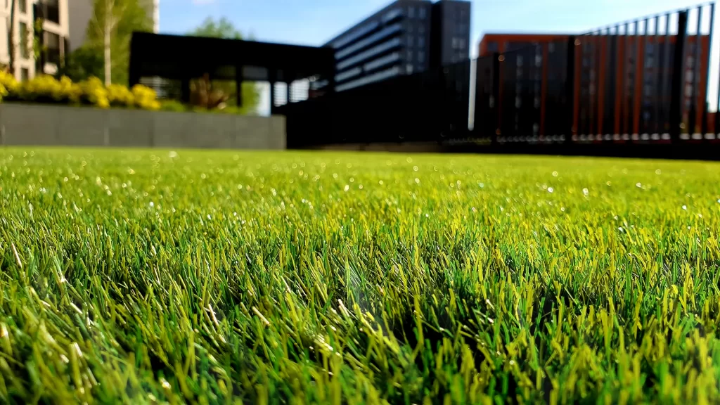 Roll of Classic artificial grass installed on a home lawn