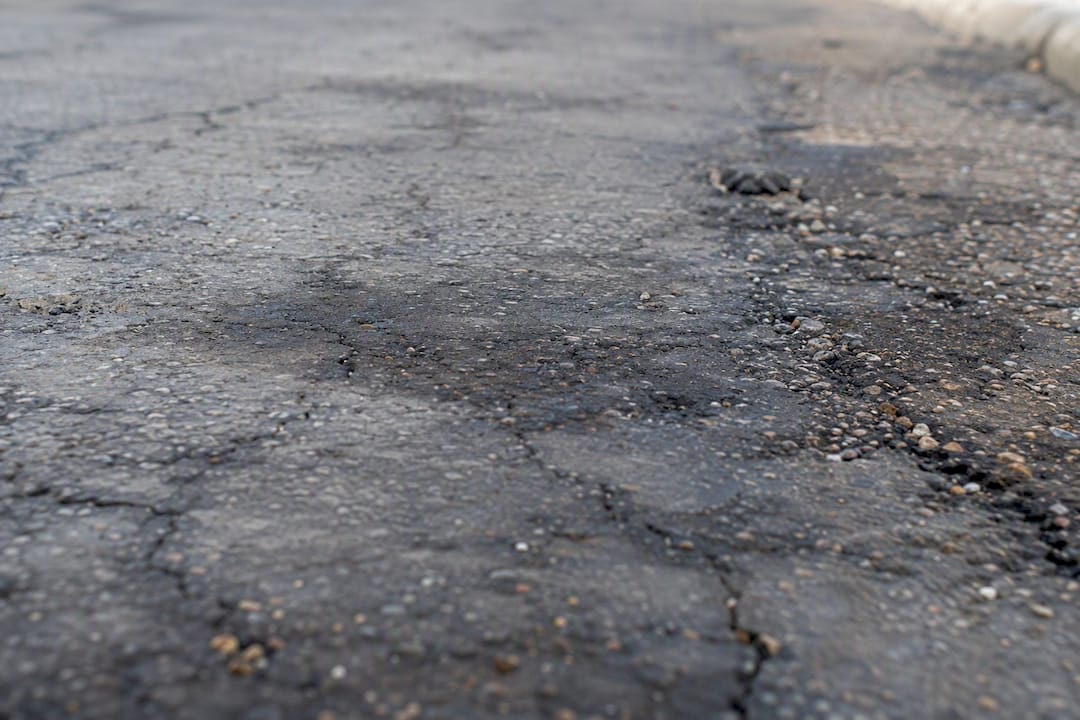 Freeze-thaw cracked asphalt close-up