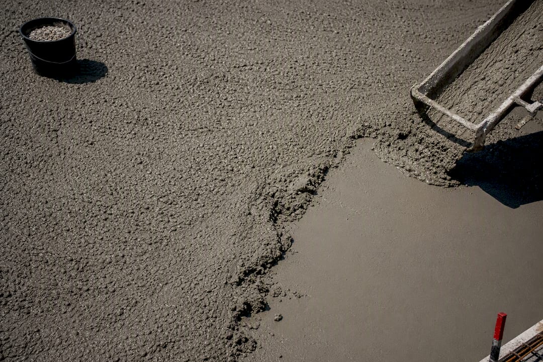 Concrete surface showing smooth and torn areas