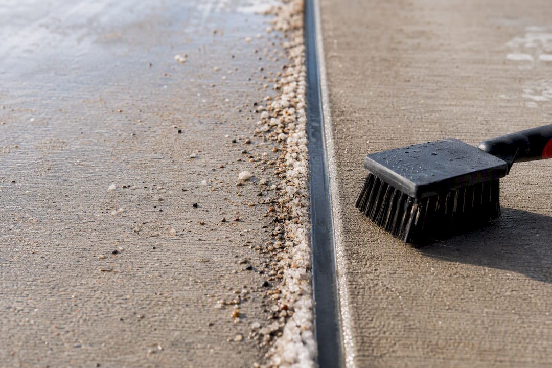 Concrete control joint with salt residue